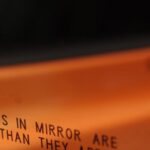 Battery Warning - Objects in mirror are closer than they appear