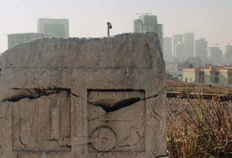 Virtual Memory - A stone monument with a city in the background