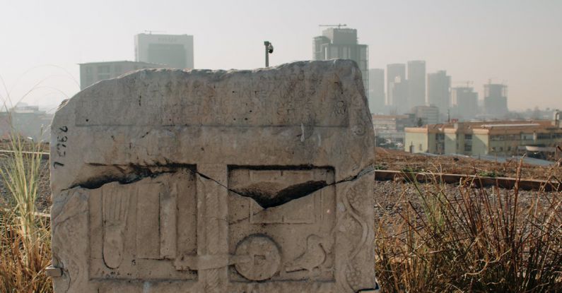 Virtual Memory - A stone monument with a city in the background