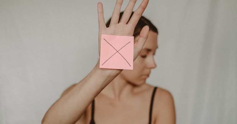 Alert Sign - Woman with paper with cross sign