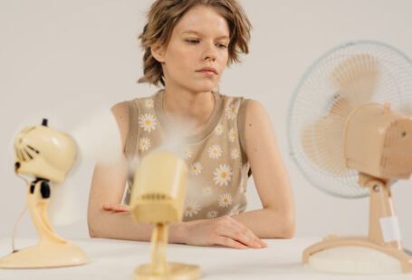 Cooling Fans - Girl Sitting with Fans