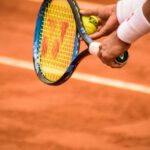 ESD Wristband - Close-Up Photo of Person Holding Tennis Racket and Ball