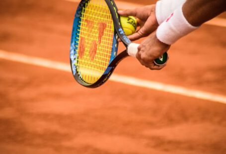 ESD Wristband - Close-Up Photo of Person Holding Tennis Racket and Ball