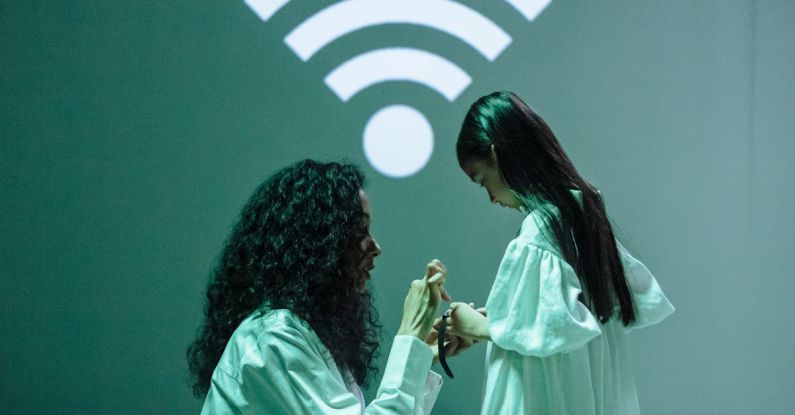 Wifi Signal - Woman in White Scrubs Connecting a Smartwatch of a Girl to Wifi